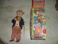 stara igračka klaun-na navijanje-zamjene za starine