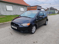 Mitsubishi Colt 1,1,20910 god,128000 km,klima,kartice