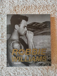 ROBBIE WILLIAMS: BIOGRAFIJA, E. Herbert