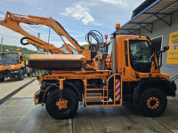 Unimog U400 2011. sa kranskim malčerom Mulag MHU800