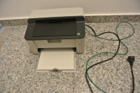 Laserski printer Brother HL-1110E,radi odlicno,sa tonerom,kablovi