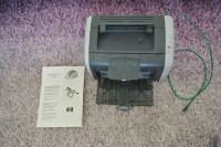 Laserski printer HP LaserJet 1015 sa potpuno novim tonerom,ispravno
