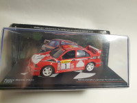 1:43 Mitsubishi Lancer EVO 4 RMC 1999. #1 Makinen, Mannisenmaki)