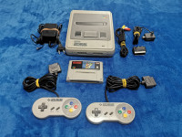 Super Nintendo + 2 joystica + mario world igra + napajanje + kabeli