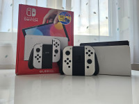 Nintendo Switch OLED + Igre + Cijela Switch oprema