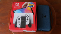 Nintendo Switch Oled + Igre + Oprema