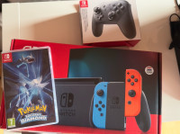 Nintendo Switch + Pro kontroler + Pokemon igrica