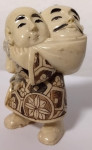 čovjek s Onijem - sculpture netsuke