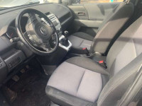 Mazda 5 prednji sicevi