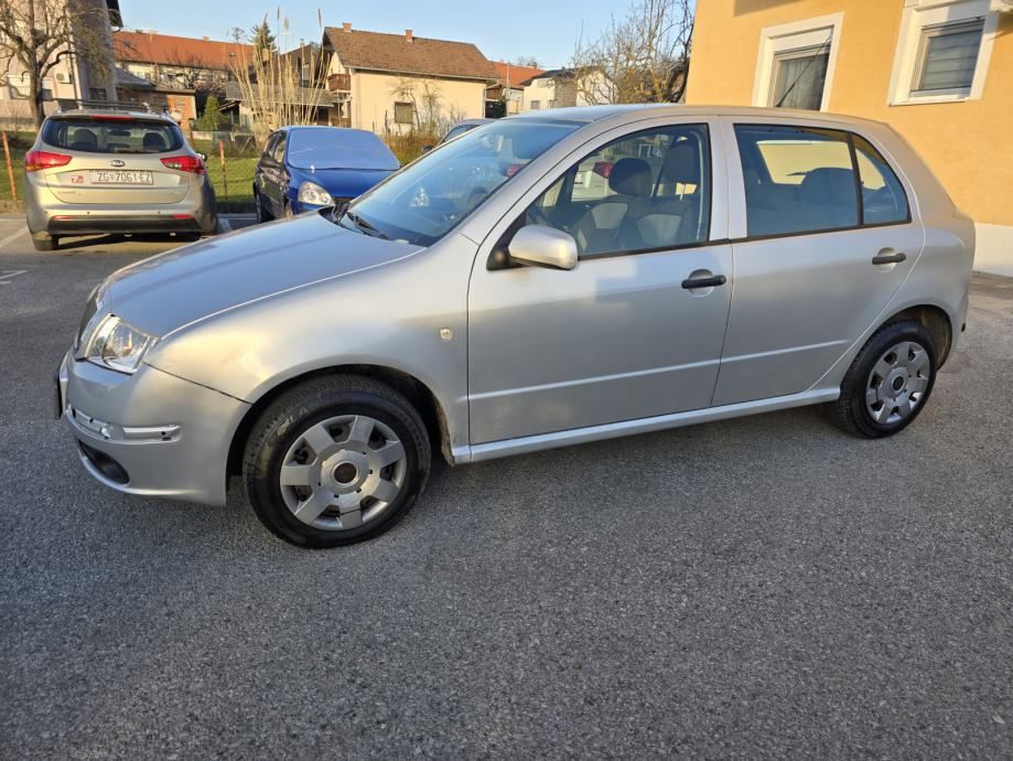 Škoda Fabia 1,2 12V,,reg 31.7.2025 može zamjena,kartice