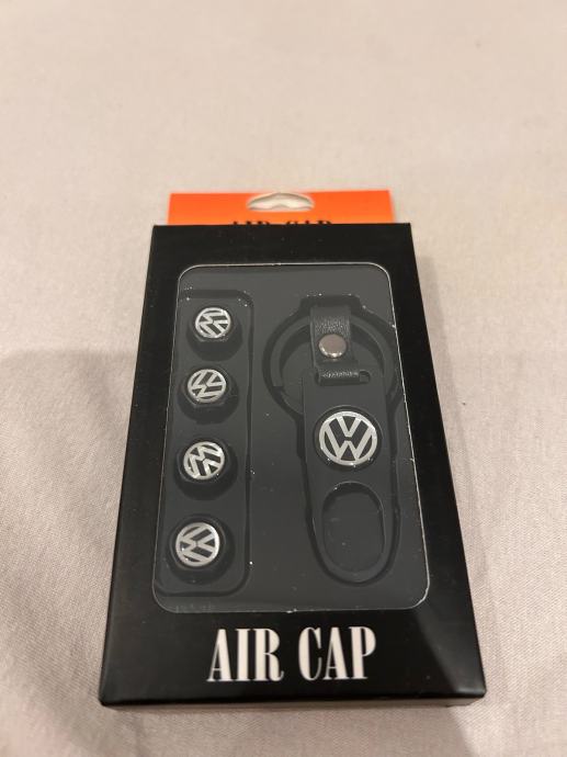 VW VOLKSWAGEN KAPICE ZA GUME SET S PRIVJESKOM crni/srebrni golf passat