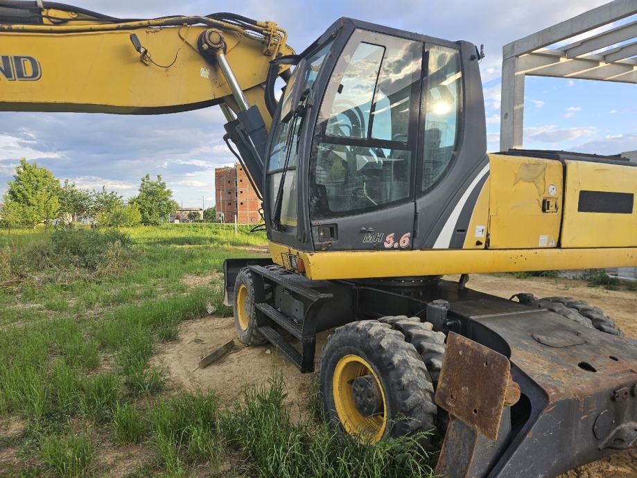 Bager točkaš (na kotačima) New Holland MH 6.6.