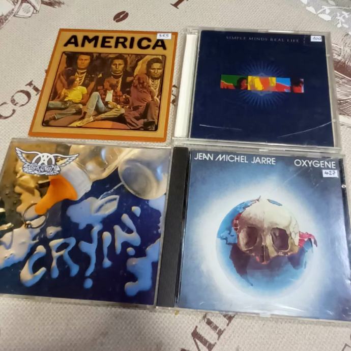 LOT CD.a
- 4 x CD -⚡️AMERICA-AEROSMITH-SIMPLE MINDS-JEAN MICHEL JARRE⚡