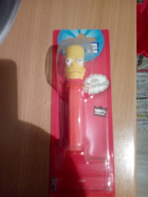 Simpsons zapakirana PEZ figurica s izvađenim bonbonima