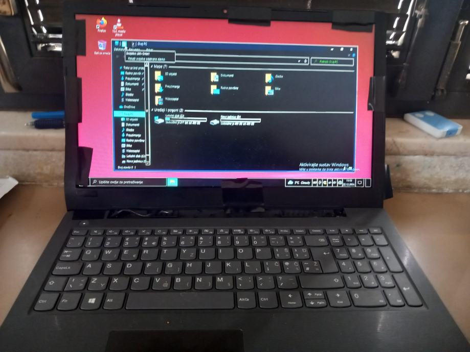 prodajem laptop lenovo ostecen