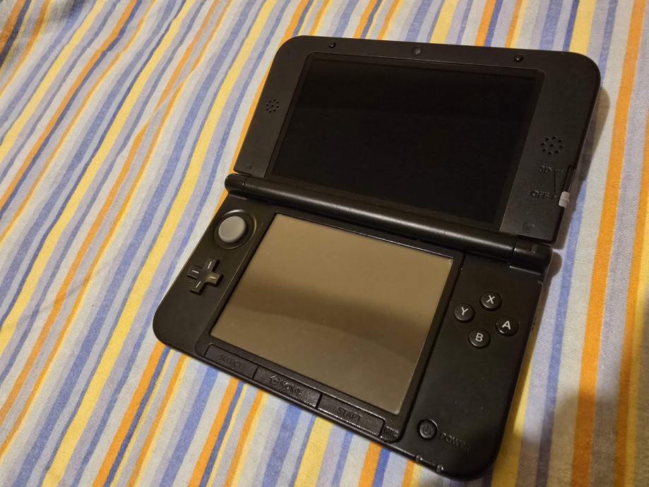 Nintendo 3DS XL + punjač + 32gb mem. kartica