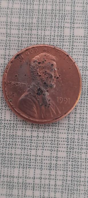 1991 one cent lincoln s greškama (error)