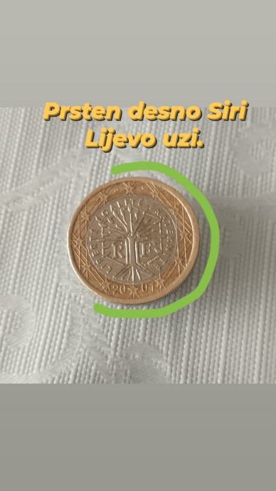 Kovanica 1€.2001.Godina Drvo Zivota Desno Prsten Siri lijevo uzi.