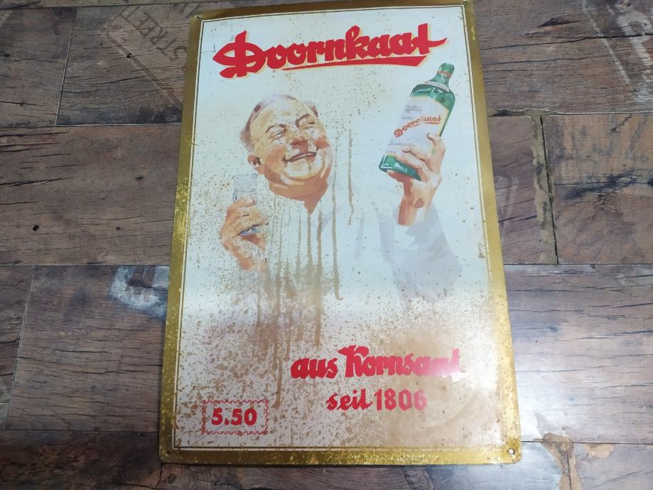 Retro limena reklama za pivo Doornkaat