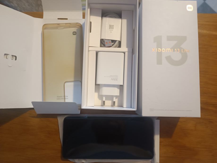 Xiaomi 13 Lite - 8/256 GB 5 G crni kao novi za 130 eura KT-ZG